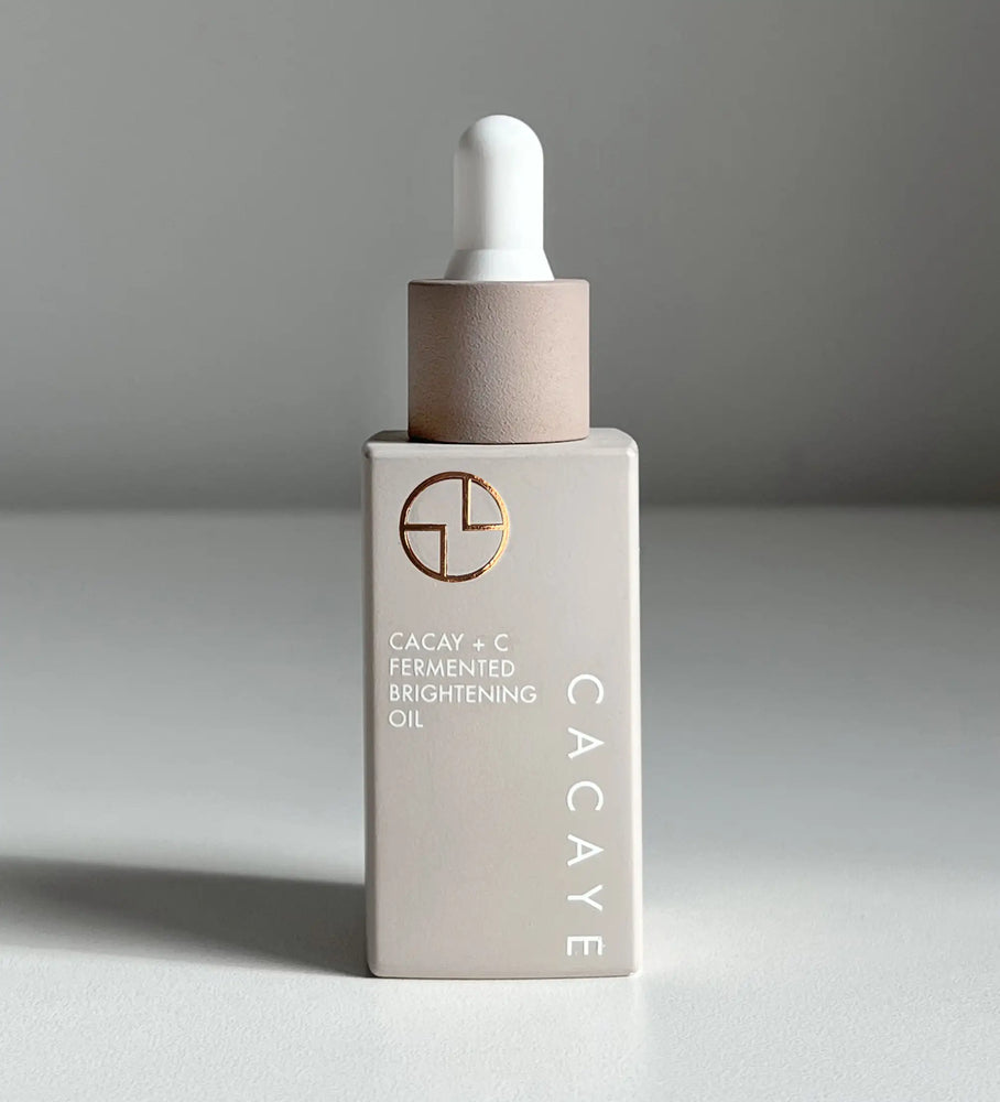 
                  
                    CACAYE CaCay + Vitamin C Fermented Brightening Oil in packaging with glass dropper
                  
                