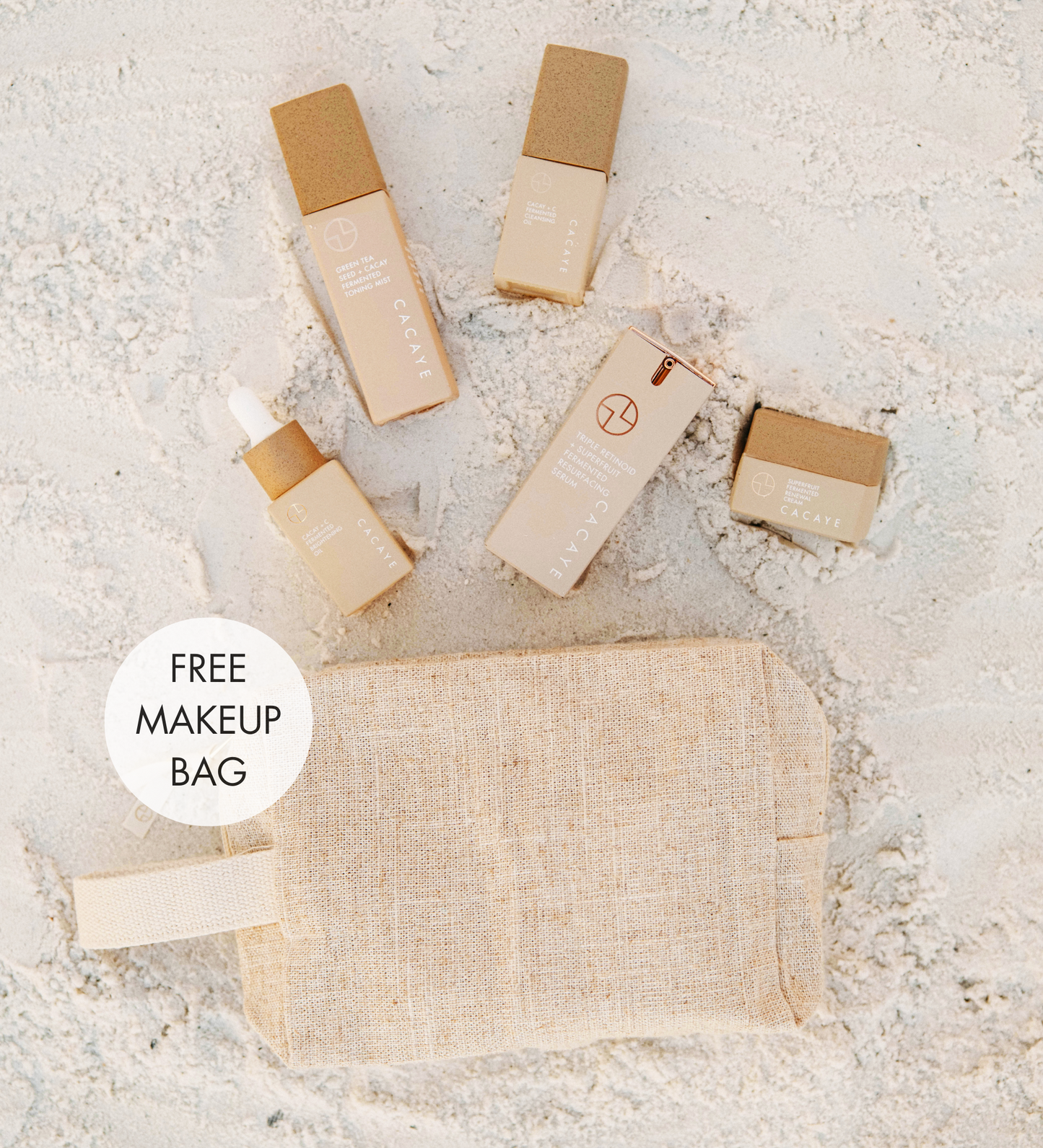 
                  
                    EXPERIENCE CACAY + FERMENTED SKINCARE MINI SET with makeup bag on beach
                  
                